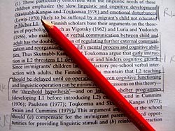 Defaced book and pencil
