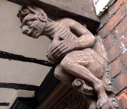 A breast-hugging grotesque