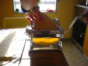 Dough going through the pasta machine