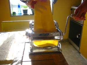 Dough going through the pasta machine